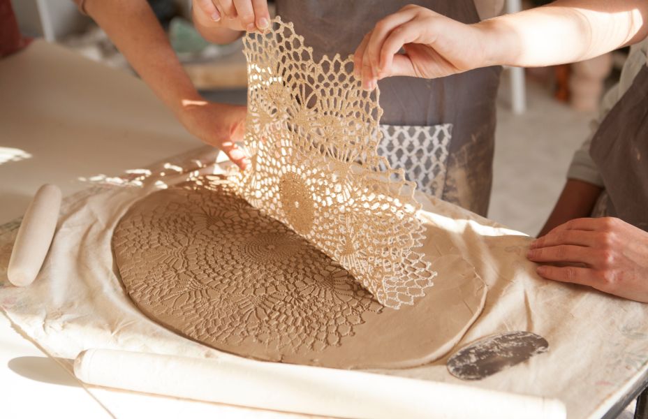 clay being embossed with lace